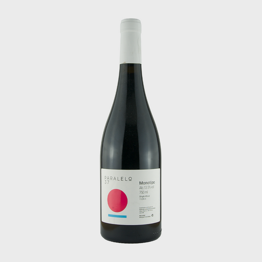Wine bottle with a white label on a light gray background